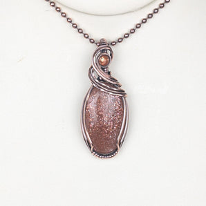 Sunstone Swirl Oval Pendant