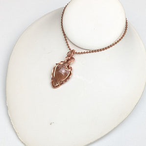 Sunstone Copper Swirl Pendant